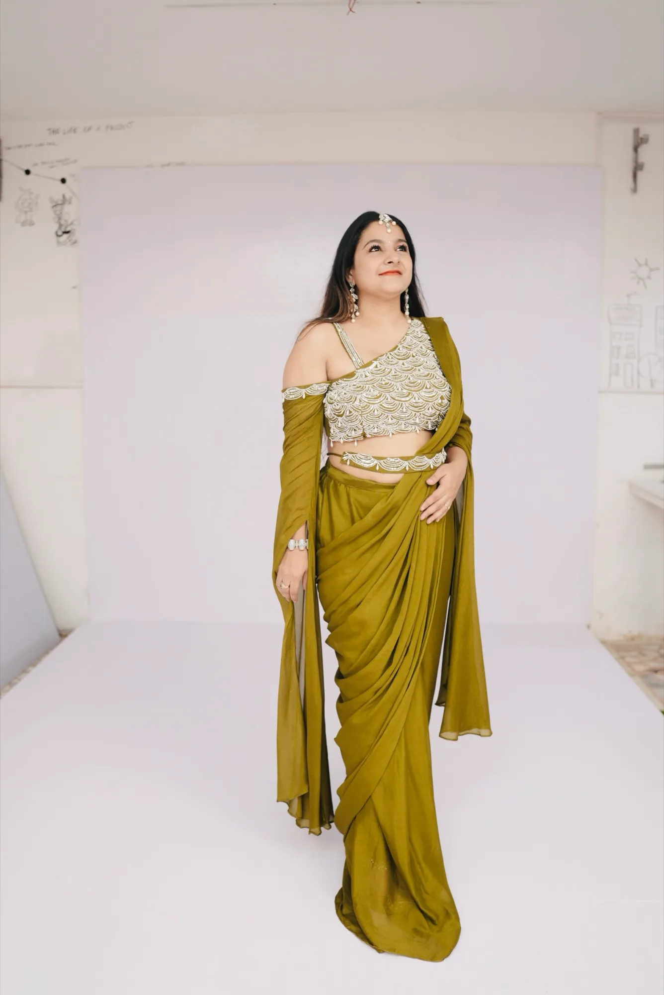 Olive green draped saree-gown — studio
